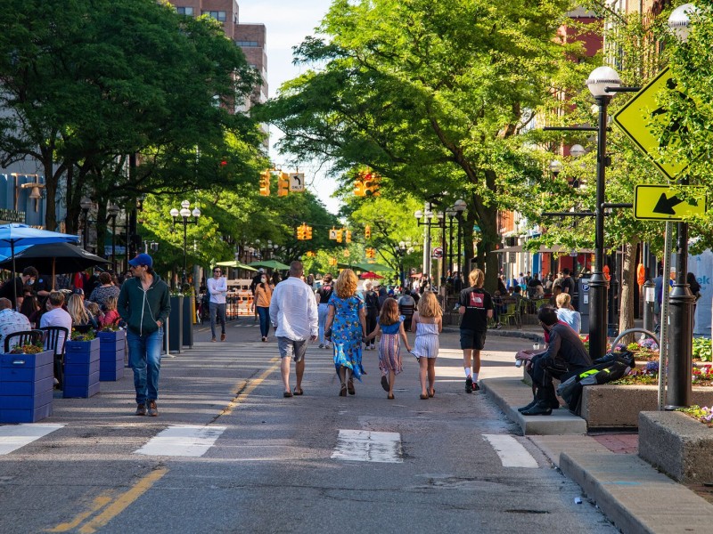 People walk in downtown Ann Arbor.