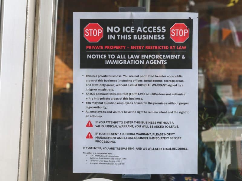 A sign in the window of Book Love Bar in Ypsilanti.