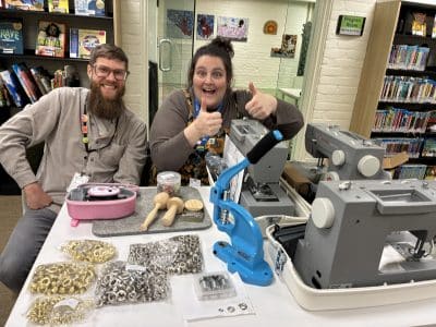 Ypsilanti District Library (YDL) Librarian Aaron Smith and Youth Librarian Stephanie Pocsi-Morrison with some of the equipment available through YDL's Library of Things, which will be used during YDL's upcoming repair clinics.