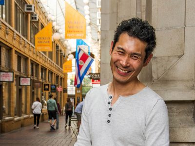 Director Trevor Zhou in Ann Arbor's Nickels Arcade.