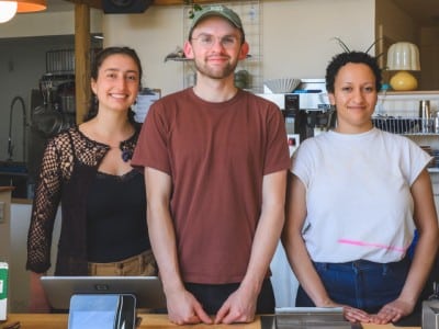Staffers Rach Sajdak, Peter Littlejohn, and Amanda Bonilla Taylor at Espy Cafe in Ann Arbor.