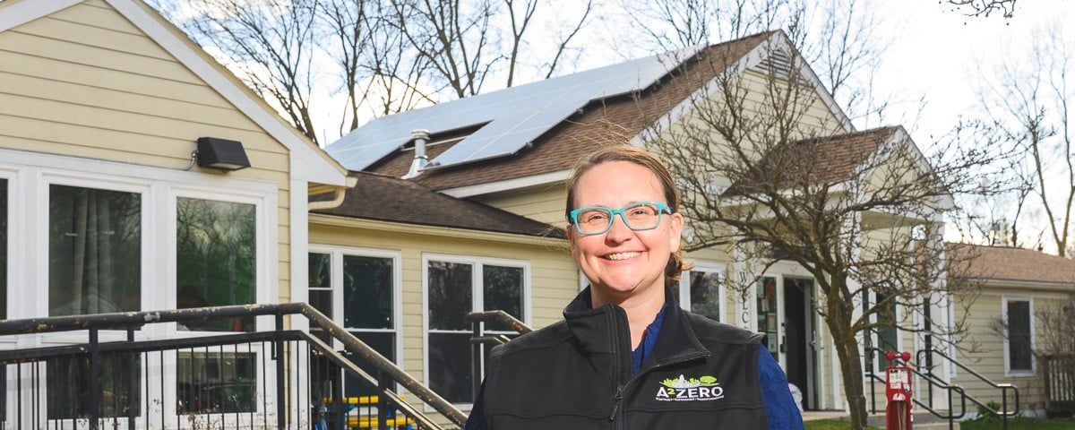 Missy Stults, Ann Arbor's sustainability and innovations director, in front of the Bryant Community Center. Ann Arbor's Bryant neighborhood will be the first to be connected to the city's new Sustainable Energy Utility.