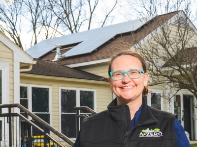 Missy Stults, Ann Arbor's sustainability and innovations director, in front of the Bryant Community Center. Ann Arbor's Bryant neighborhood will be the first to be connected to the city's new Sustainable Energy Utility.