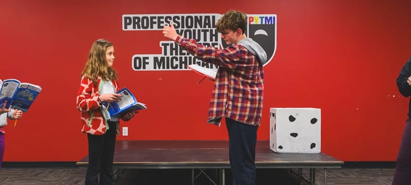 Students and staff rehearse a production of "The Little Mermaid" at the Professional Youth Theater of Michigan.