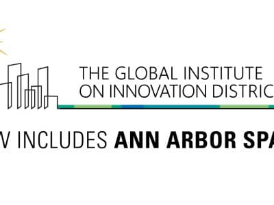 A promotional graphic announcing Ann Arbor SPARK's membership in the Global Institute on Innovation Districts.