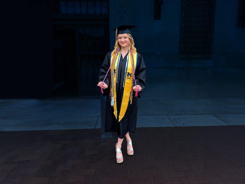 University of Michigan graduate Emily Dean shows off her Arts Honors Cords.