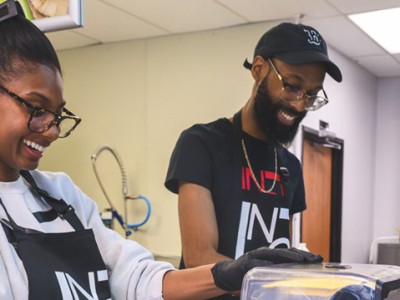 Nashia and Brandon Frye preparing smoothies at No Label Juice.