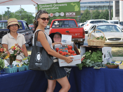 The Ypsilanti Growers Cooperative offered home and hobby gardeners a cooperative table where they could sell their produce at the Ypsilanti Farmers Market in 2012 and 2013.
