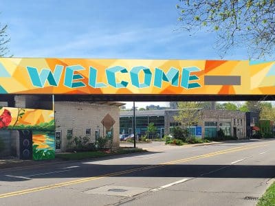 A design rendering of a planned mural on the North Main Street railroad overpass in Ann Arbor.