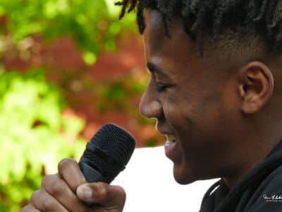 A participant performs at a 2019 Noise Permit event at the Ypsilanti District Library.