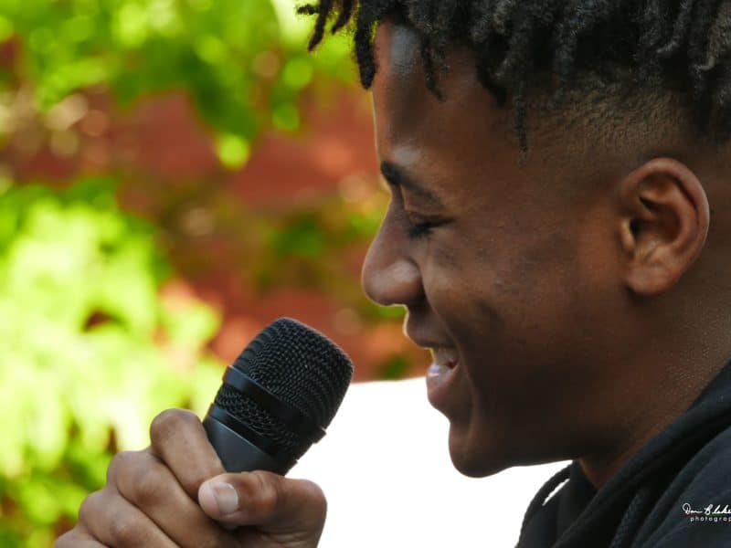 A participant performs at a 2019 Noise Permit event at the Ypsilanti District Library.