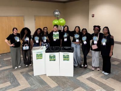 Members of the student-led team that spearheaded a zero-waste initiative at the annual Southeast Michigan Stewardship Coalition meeting at Eastern Michigan University.