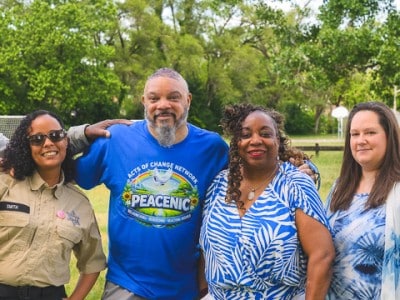 Peacenic volunteers Eugene Rush, Toneka Smith, Rev. Joseph Jackson, Carla Wilson, Jamie Kelsey, and Marc Wilson in West Willow Park.