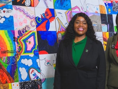 Eastern Michigan University Director of Admissions Dr. LaJoyce Brown and Ypsilanti Community Schools Superintendent Alena Zachery-Ross at Ypsilanti Community High School.