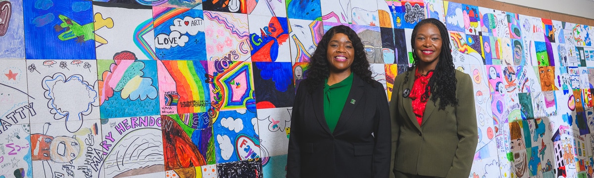 Eastern Michigan University Director of Admissions Dr. LaJoyce Brown and Ypsilanti Community Schools Superintendent Alena Zachery-Ross at Ypsilanti Community High School.