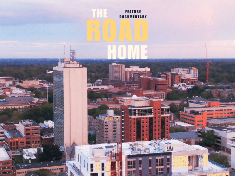 A promotional image for the documentary film "The Road Home."