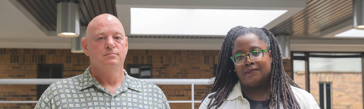 Jeff Tritten, president of Washtenaw Optimal Wellness, and Charlyn VanDeventer, health equity manager for the Washtenaw County Health Department.