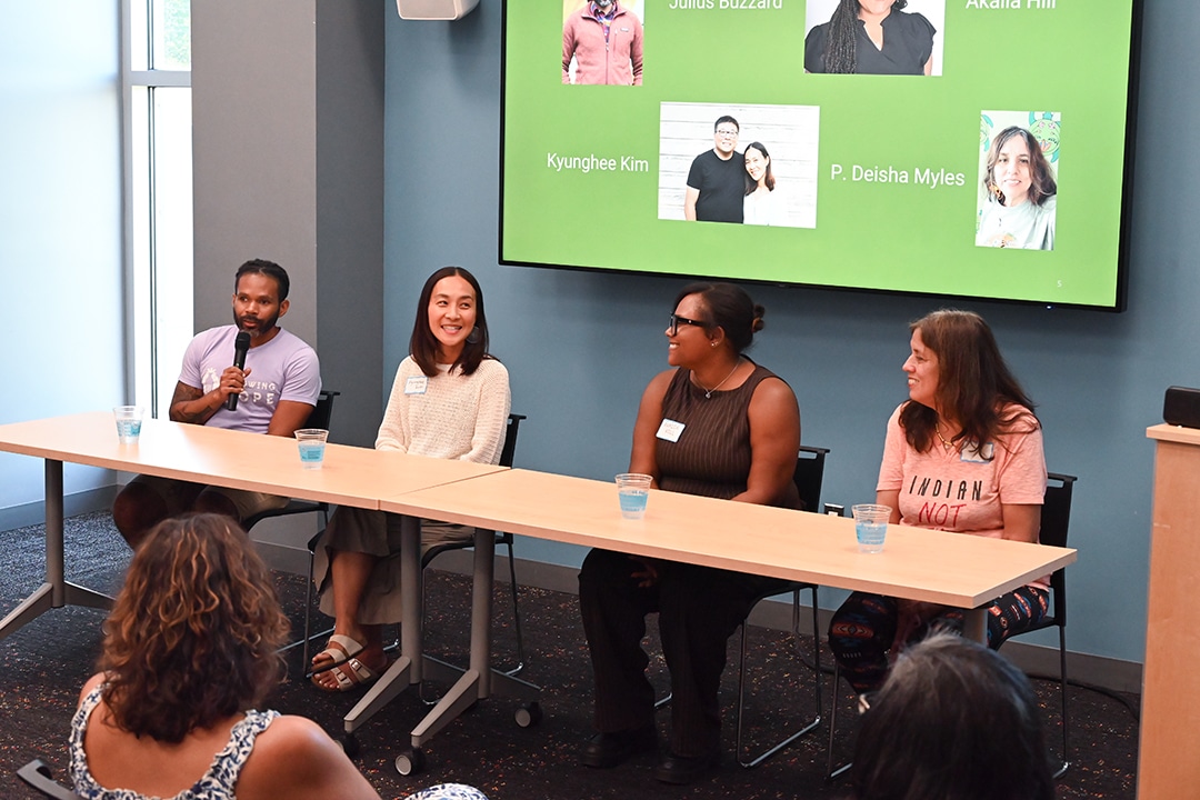 A panel discussion at an opening reception at the Ypsilanti District Library's Superior Branch for the expansion of the Ypsi Farmers & Gardeners Oral History Project. Project interviewees Julius Buzzard, Kyunghee Kim, Akaiia Hill, and P. Deisha Myles are pictured left to right.